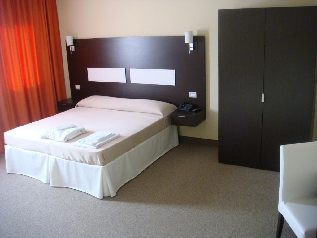 Santa Loja Hotel Residence Tito Rum bild