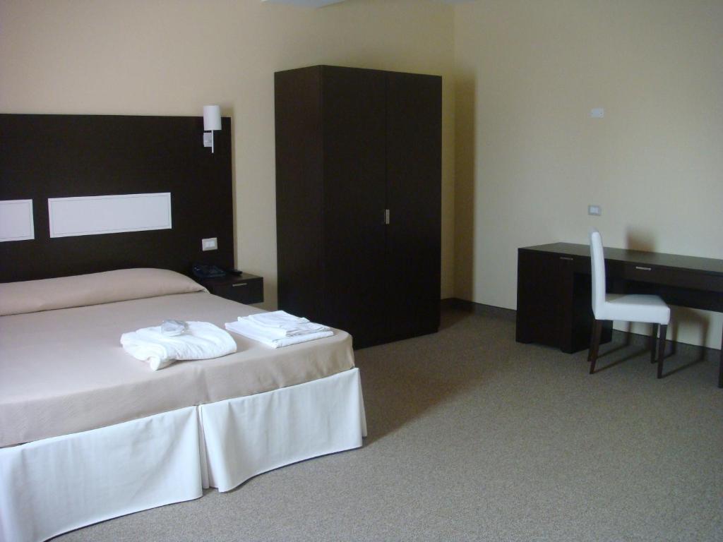 Santa Loja Hotel Residence Tito Rum bild
