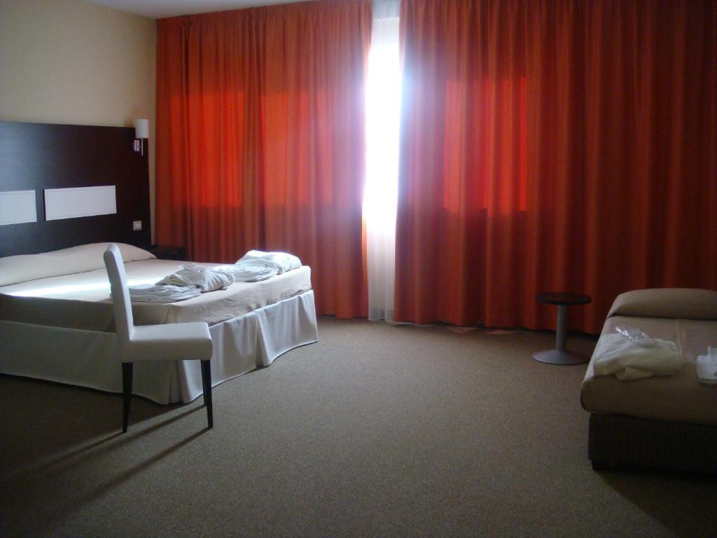 Santa Loja Hotel Residence Tito Rum bild